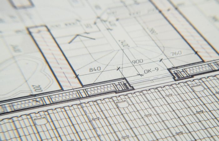 Close-up of an architectural blueprint showcasing intricate design details for a building layout.